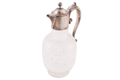 Lot 502 - A Victorian silver mounted claret jug; the...
