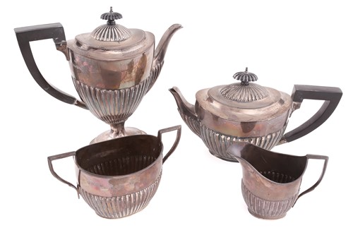 Lot 482 - A matched Victorian and later four piece...