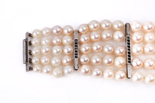 Lot 262 - A five-row graduated pearl bracelet with...