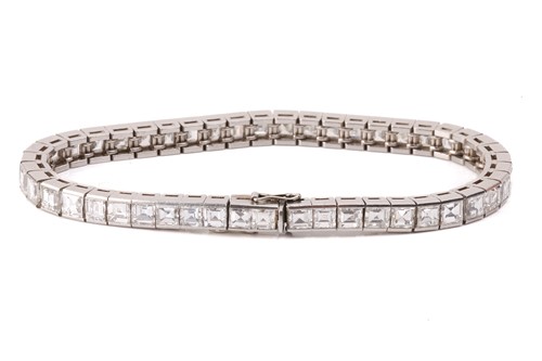 Lot 278 - A diamond line bracelet, incorporating...