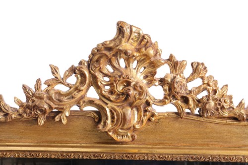 Lot 151 - A 19th-century moulded and gilt plaster mirror...