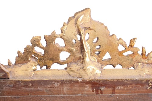 Lot 151 - A 19th-century moulded and gilt plaster mirror...