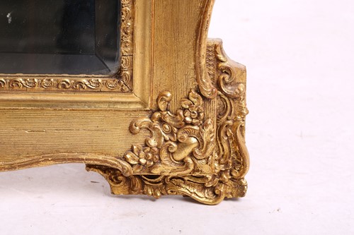 Lot 151 - A 19th-century moulded and gilt plaster mirror...