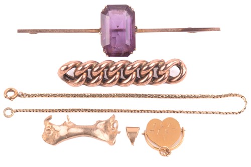 Lot 263 - An amethyst bar brooch stamped 9ct to the...