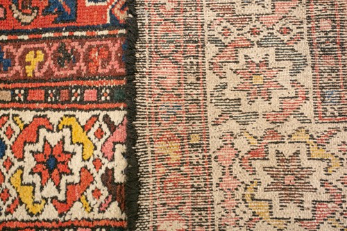 Lot 152 - • An antique Hammadan/Malayer runner with a...