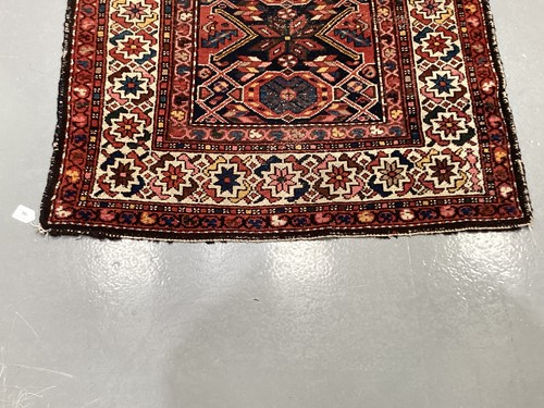 Lot 152 - • An antique Hammadan/Malayer runner with a...