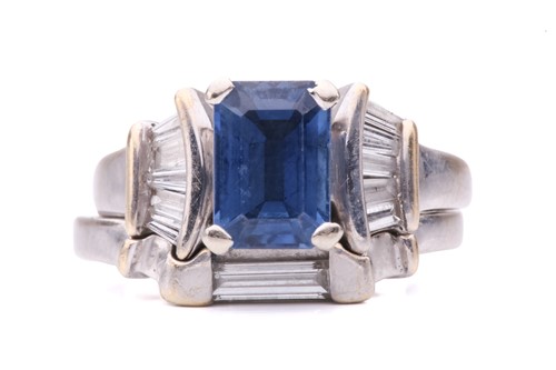 Lot 191 - A sapphire and diamond ring, set with a mixed...