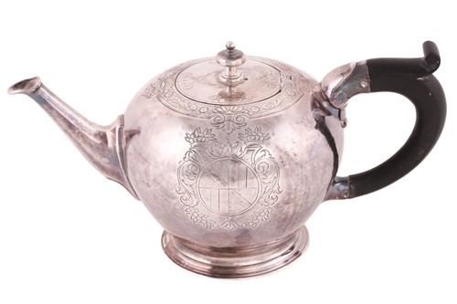 Lot 434 - A George II silver bullet shape teapot, Thomas...