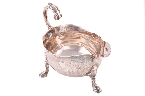 Lot 504 - A George II silver sauce boat, possibly John...