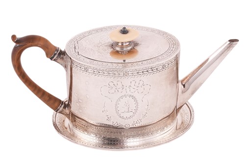 Lot 535 - A George III oval silver teapot & stand,...