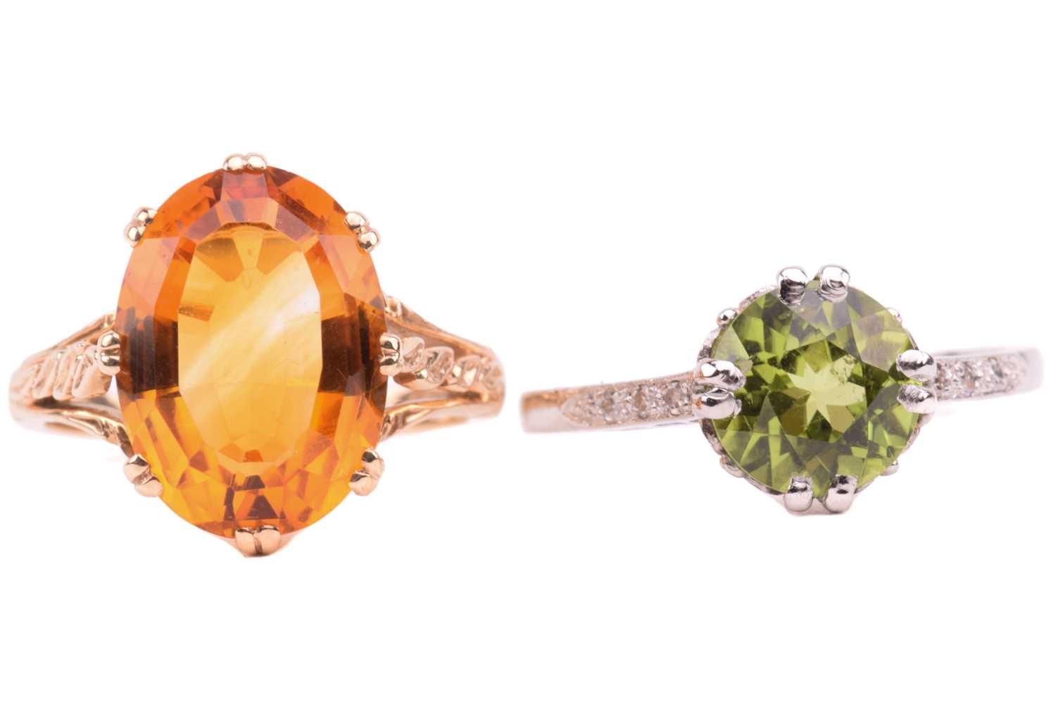 Lot 169 - A peridot solitaire ring and a citrine ring in...