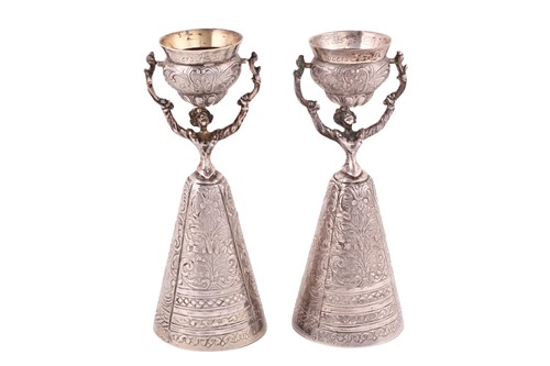 Lot 507 - A pair of silver wager cups, each modelled as...