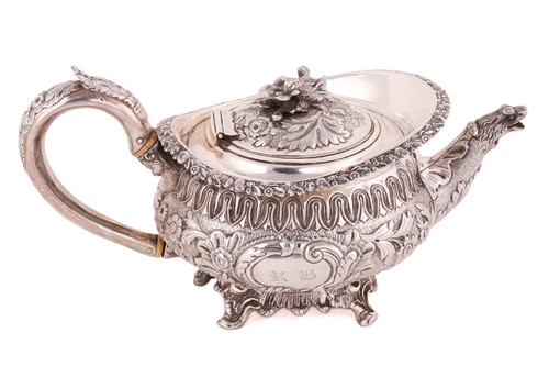 Lot 540 - A George IV silver teapot, London 1824, makers...