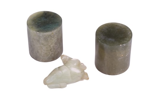 Lot 118 - A Chinese-turned translucent light green Jade...