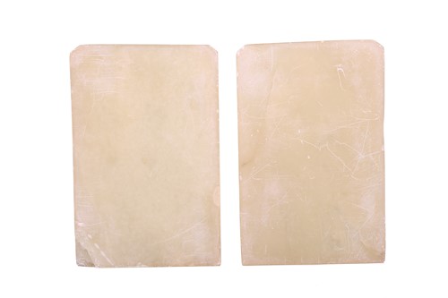 Lot 118 - A Chinese-turned translucent light green Jade...