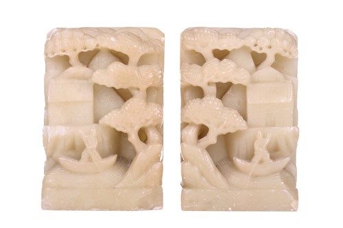 Lot 118 - A Chinese-turned translucent light green Jade...