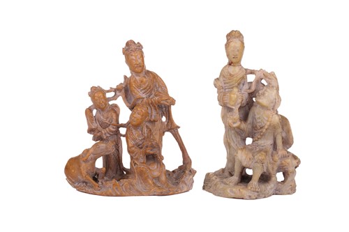 Lot 118 - A Chinese-turned translucent light green Jade...