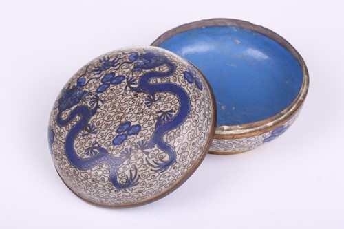 Lot 118 - A Chinese-turned translucent light green Jade...