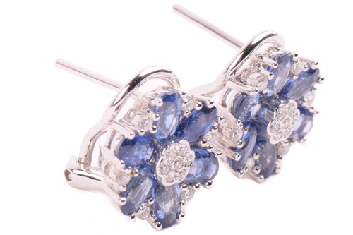 Lot 168 - A pair of sapphire and diamond flowerhead...