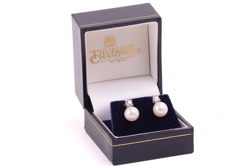 Lot 142 - A pair of cultured pearl and diamond earrings...