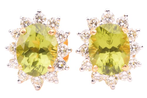 Lot 196 - A pair of peridot and diamond cluster earrings,...