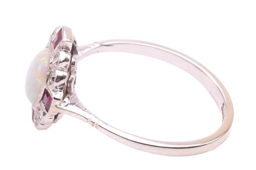 Lot 221 - An Art Deco opal, ruby and diamond dress ring,...