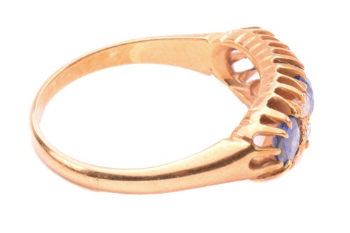 Lot 163 - An Edwardian sapphire and diamond half hoop...