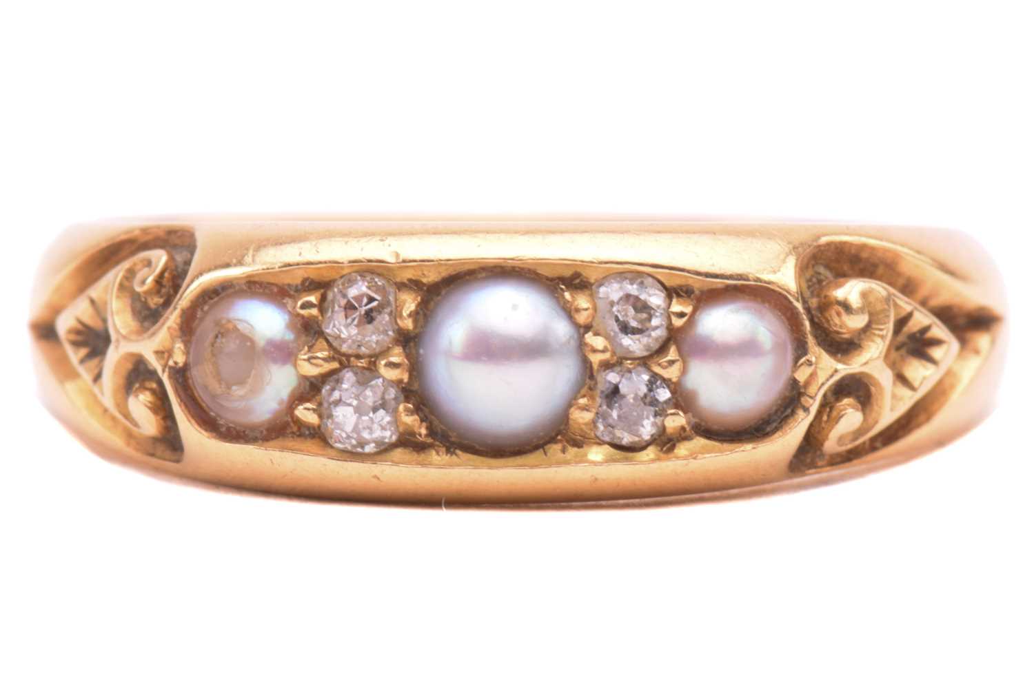 Lot 230 - A Victorian pearl and diamond half-hoop ring,...