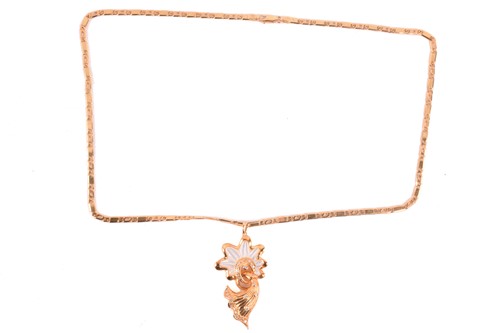 Lot 113 - A diamond and mother of pearl pendant, the...