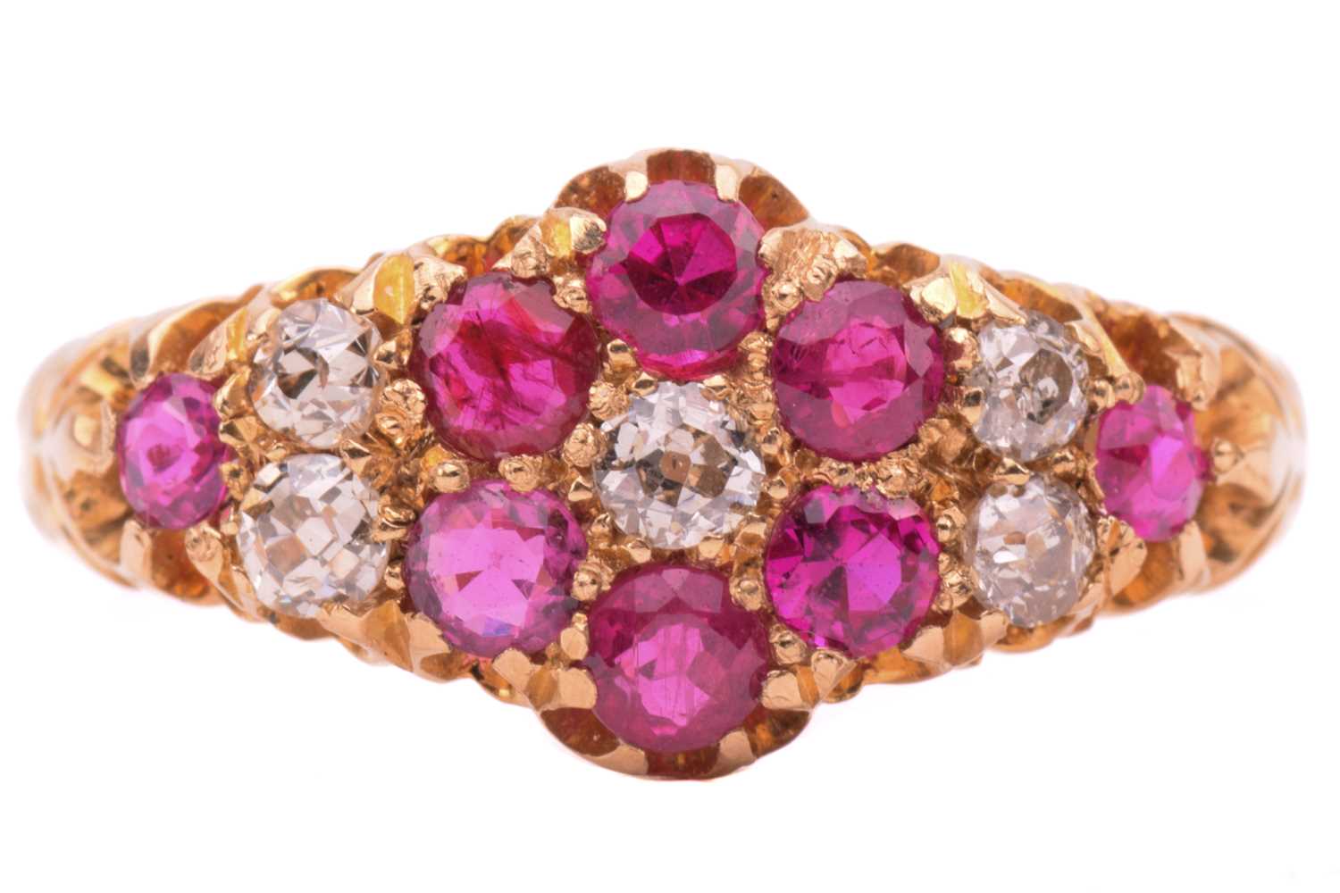 Lot 175 - An Edwardian ruby and diamond cluster ring,...
