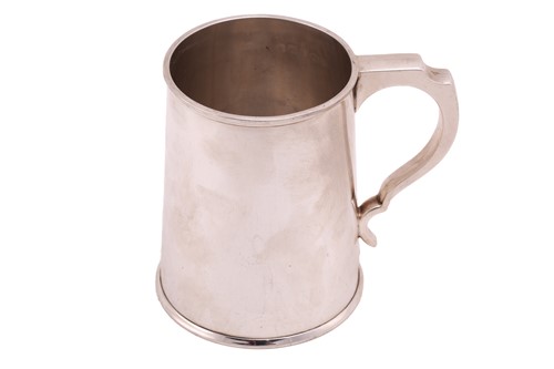 Lot 492 - A silver tankard of plain tapering cylindrical...