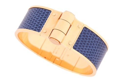 Lot 141 - Hermès - a Charnière cuff bracelet, a wide...