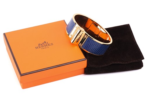 Lot 141 - Hermès - a Charnière cuff bracelet, a wide...