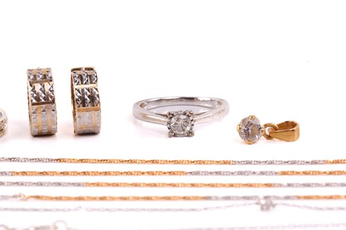 Lot 115 - A diamond engagement ring, a wedding band and...