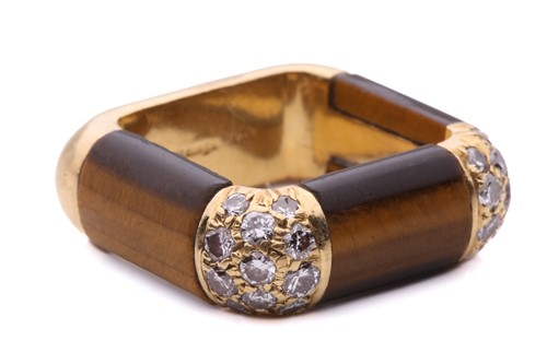 Lot 278 - A tiger's eye and diamond dress ring in 18ct...