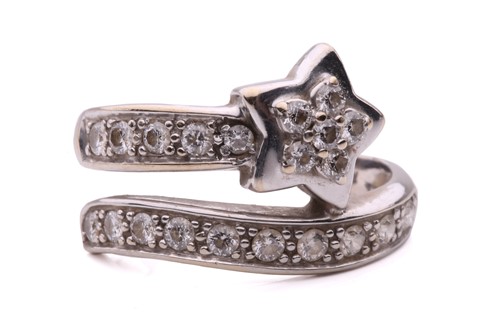 Lot 144 - A diamond set star ring, designed as a...