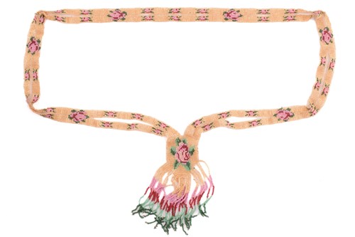 Lot 210 - A 1920's beaded sautoir necklace with a rose...