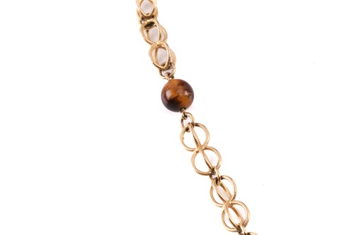 Lot 64 - A cage link necklace with tiger's eye bead...
