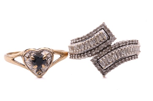 Lot 148 - A diamond multi-row cross over ring, set with...