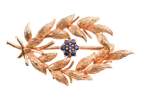 Lot 47 - A gold and sapphire spray brooch by Cropp &...