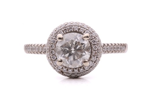 Lot 192 - A diamond cluster ring, set with a round...