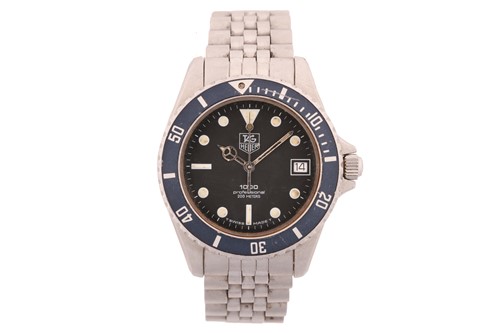 Lot 446 - A Tag Heuer Professional 1000 series quartz...