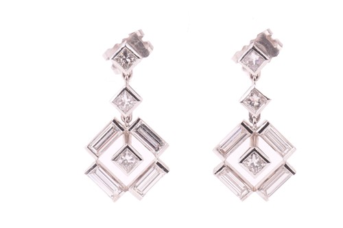 Lot 61 - A pair of diamond earrings, each with a...