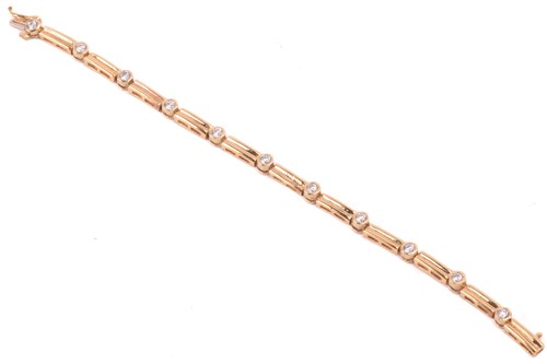 Lot 127 - A CZ baton link bracelet, set with alternating...