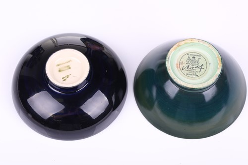 Lot 106 - A pair of Walter Moorcroft circular pottery...