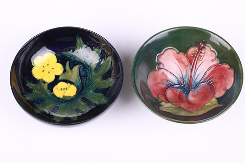 Lot 106 - A pair of Walter Moorcroft circular pottery...