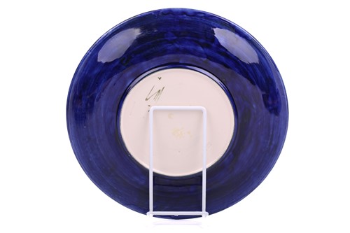 Lot 106 - A pair of Walter Moorcroft circular pottery...