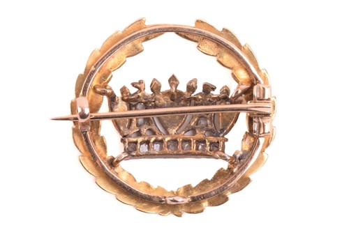 Lot 297 - A naval crown badge set with diamonds, centred...