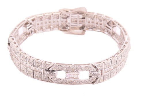 Lot 250 - A diamond bracelet, set with round brilliant...