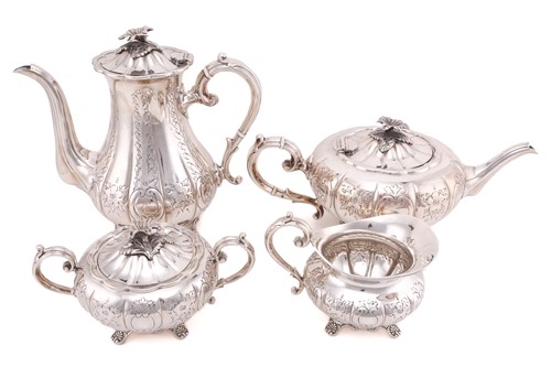 Lot 512 - A four piece tea and coffee set; lobed, low...